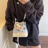 Delicate cartoon bear print drawstring women's bucket bag new cute versatile women's shoulder messenger bag