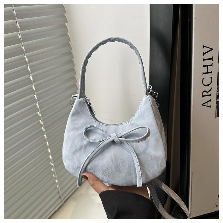 Niche handbag women's 2025 new fashionable versatile shoulder underarm bag, foreign style super fire messenger crescent bag