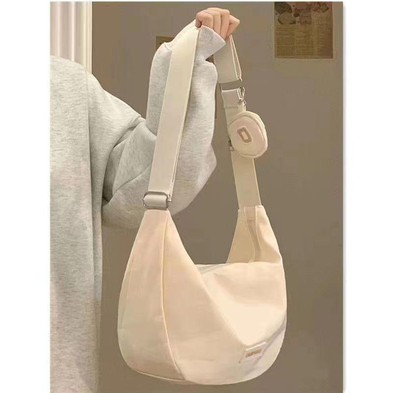 

Japanese Versatile Canvas Crossbody Bag - Large Capacity Dumpling Bag for Autumn/Winter, Female College Student & Commute Shoulder Bag High-quality Thickened [Ready to Ship]