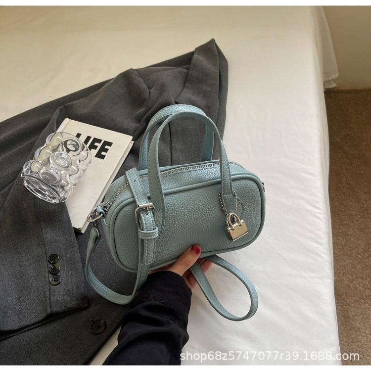 

Foreign-style girl exquisite bowling bag women s 2025 summer new Korean portable messenger bag commuter shoulder bag синий