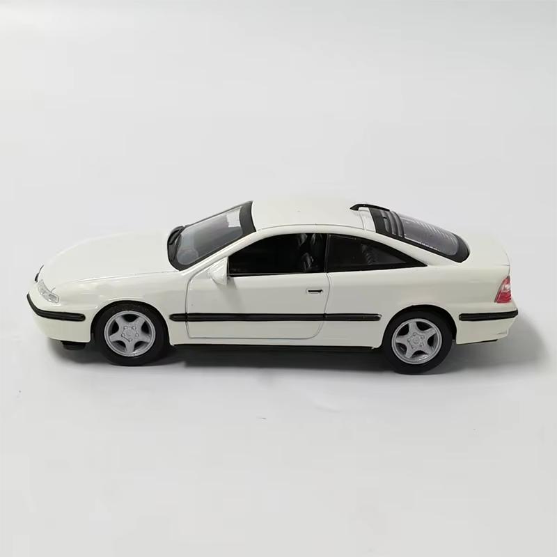 Vrac Sans boîte 1:Modèle de Voiture en Alliage Opel Calibra 1995 Échelle 43 Collection Statique Jouets de Fête Décorés Cadeau Souvenir