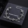 Europäische und amerikanische Kreuzhalsketten für Männer, leichte Luxus-High-End-Armbänder für Frauen, modische und einzigartige Pulloverketten, Schlüsselbein-Kette