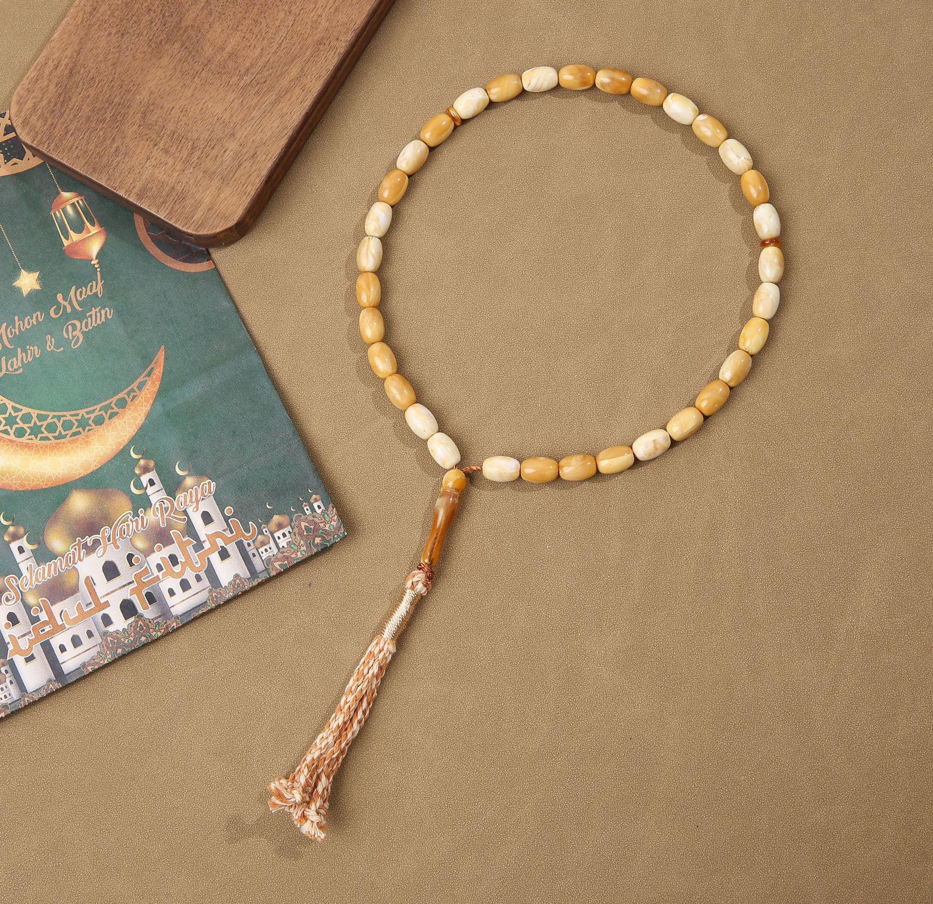 

Мусульманский браслет-тасбих из 33 бусин темно-желтого