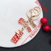 2025 New Year Red Enamel 'Safe and Happy' Persimmon Keychain – Blessing Ornament for Prosperity