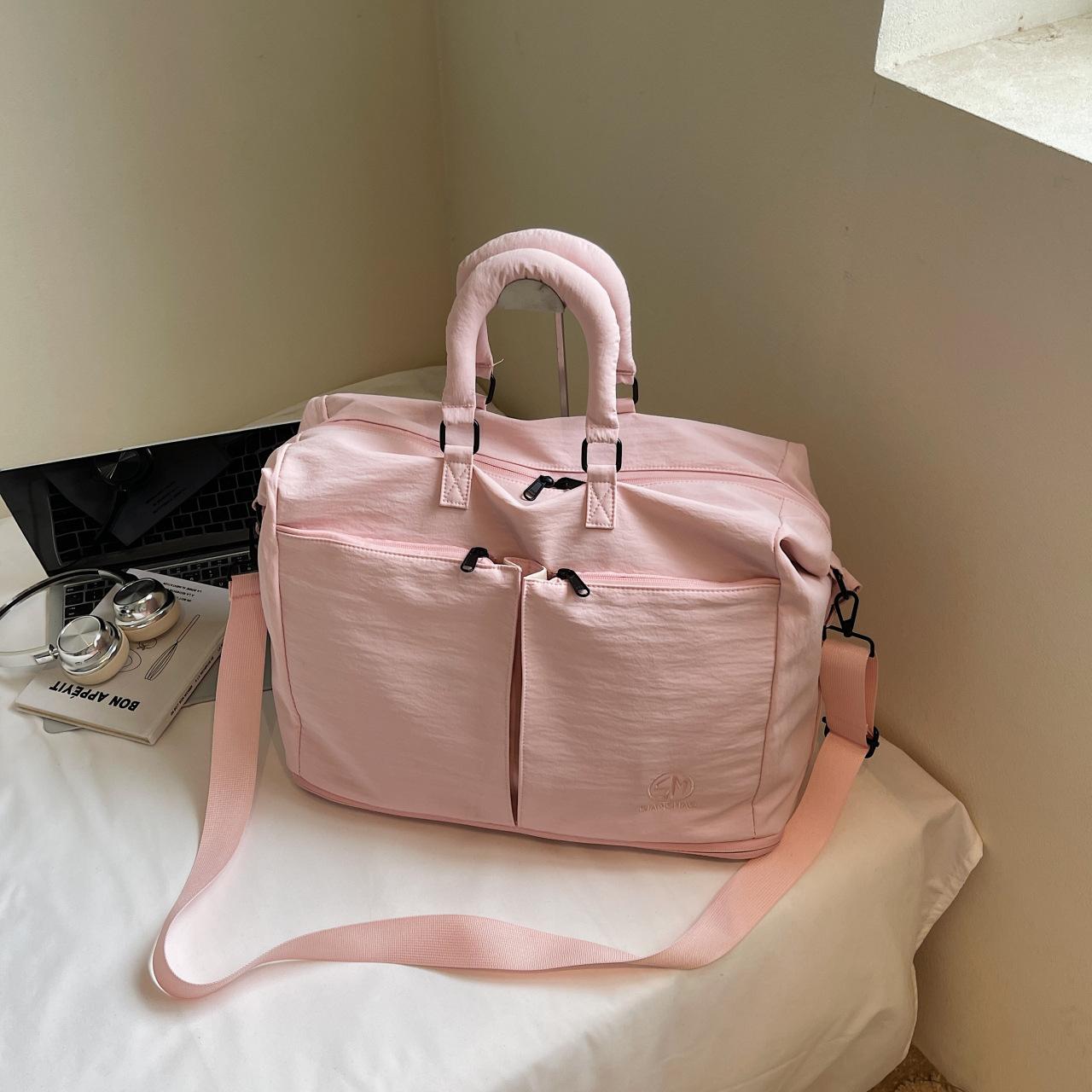 

Large capacity short trip bag Women s business travel hand-held boarding bag One shoulder expandable sports fitness storage bag розовый