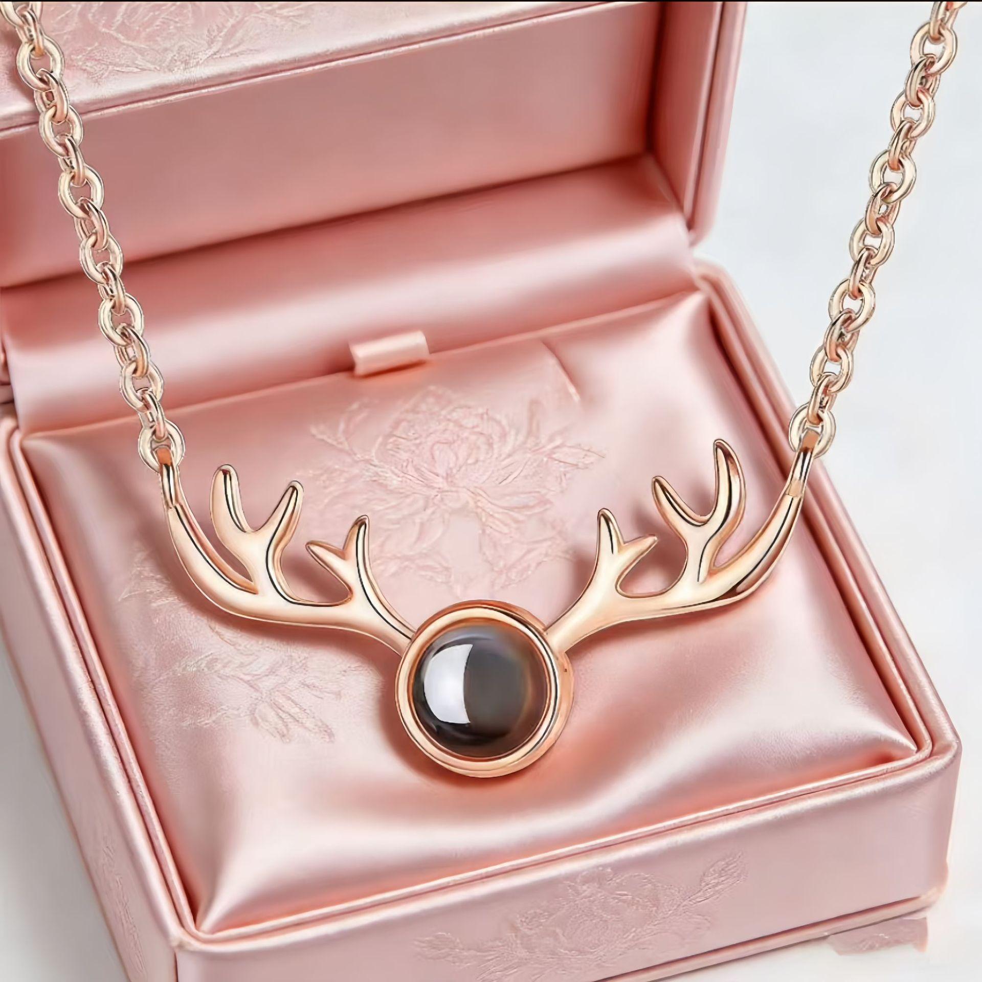 Stainless Steel Deer Pendant Necklace with Zircon Antlers and Heart Projection