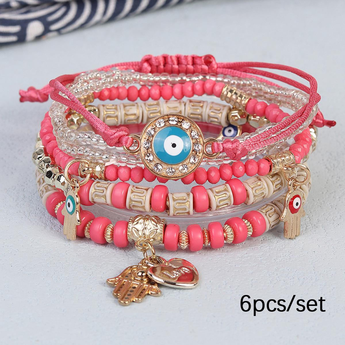 

Bohemian Multi-Layer Beaded Bracelet with Eye, Palm, Heart & Tassel Pendants
