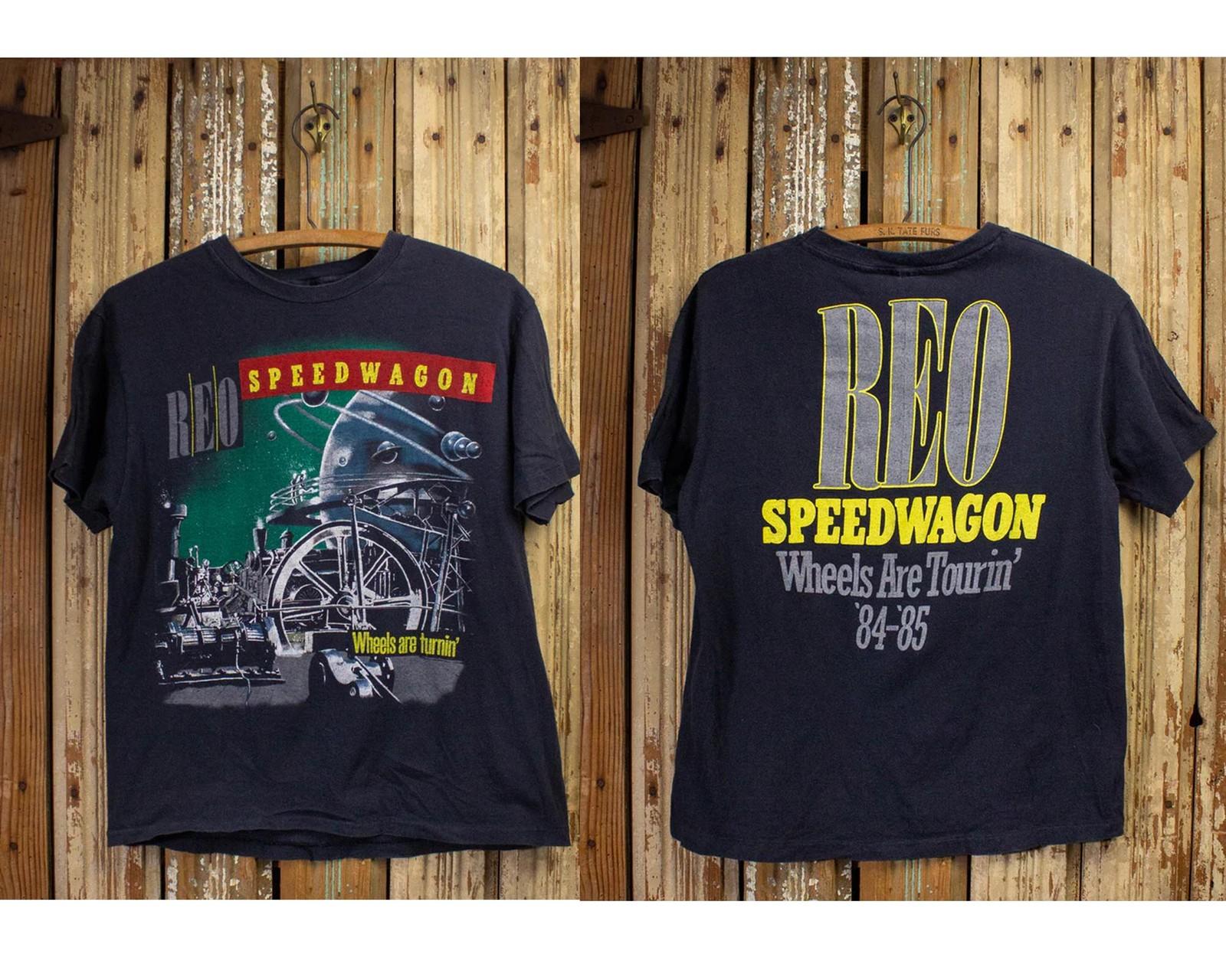 

Vintage REO Speedwagon Wheels Are Turnin Tour T Shirt 1984-85 Reprint Unisex T-Shirt S