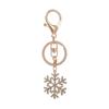 Christmas Snowflake Metal Keychain Set: Exquisite Small Hollow Gold Pendants