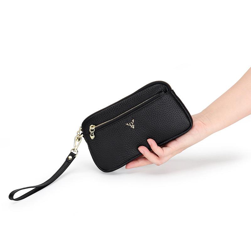 Pochette in pelle da donna 2025 nuova portafoglio lungo in pelle di mucca borsa a mano per madre borsa portamonete in pelle morbida borsa versatile per cellulare