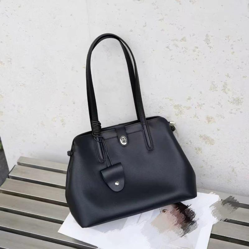 Leder-Umhängetasche große Kapazität vielseitig Herbst und Winter neu Achseltasche leichter Luxus Anhänger schlicht Nische Damen-Tasche