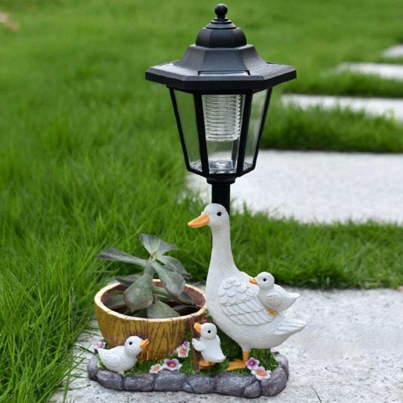 Elegant Solar Activated White Bird Garden Figure Featuring Traditional Street Light For Outside Enhancement Durable Against Different Climate
