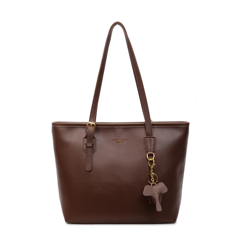 

Large-capacity commuter tote bag women s new high-end shoulder bag college student class handbag темно-коричневого