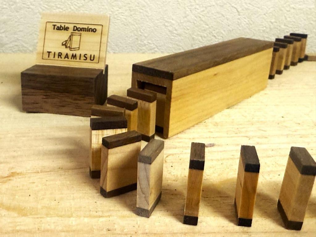 Stylish maple x walnut wooden domino set.