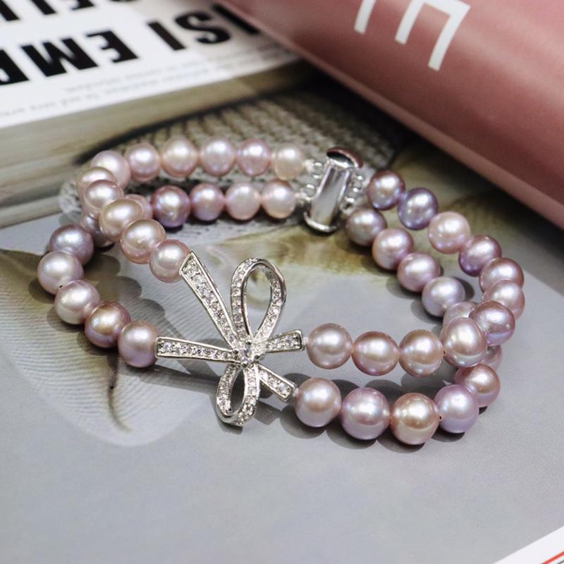 077 Freshwater Pearl Bracelet 7-8mm with Bow Design: Versatile, Elegant, High Luster Jewelry with Minor Flaws
