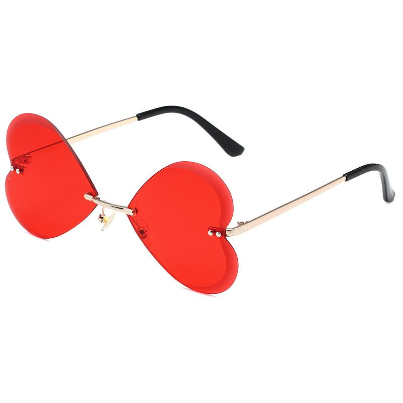 Butterfly frameless sunglasses, European and American retro trend love peach heart personalized metal sunglasses women