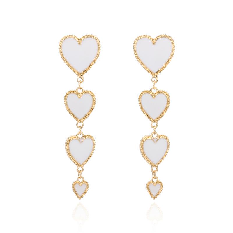 

European and American exaggerated long stud earrings, popular jewelry retro Hong Kong style love fringed earrings білий