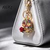 Gothic Skull Keychain Holding Rose Rhinestone for Halloween Skeleton Halloween Head Key Ring Chain Accessory Handbags Backpacks Zinc Alloy Ring