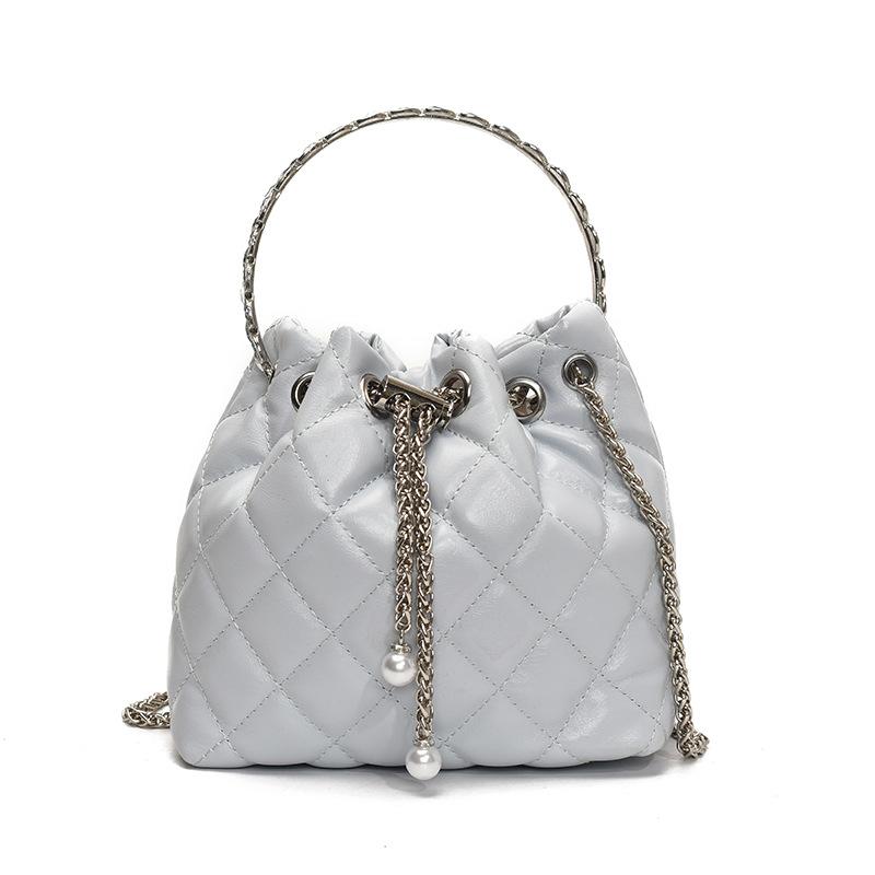 Beliebte Großhandelsnische Freizeit Rautenmuster tragbare plissierte Eimertasche Koreanische Mode vielseitige leichte Luxus Ketten Umhängetasche