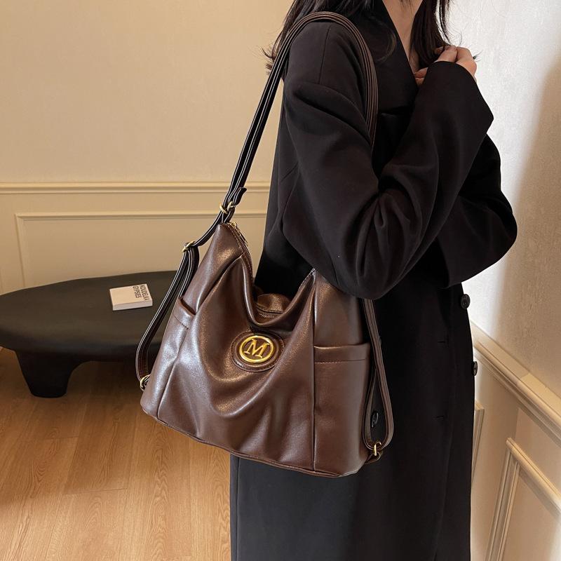 

Женская сумка-тоут 2025 новая большая вместительная дорожная сумка многофункциональная повседневная наплечная сумка рюкзак для выхода 31*13*28 темно-коричневого