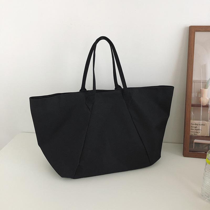 

Large Capacity Minimalist Japanese-Style Tote Bag - Trendy Shoulder Bag for Commute and Shopping чорний