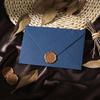 Retro Chinese Linen Pattern Letter Set with Kraft Paper, Sealing Wax, and Envelopes.