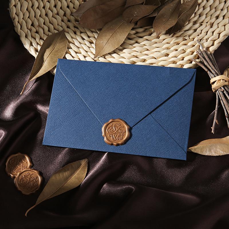 Retro Chinese Linen Pattern Letter Set with Kraft Paper, Sealing Wax, and Envelopes.
