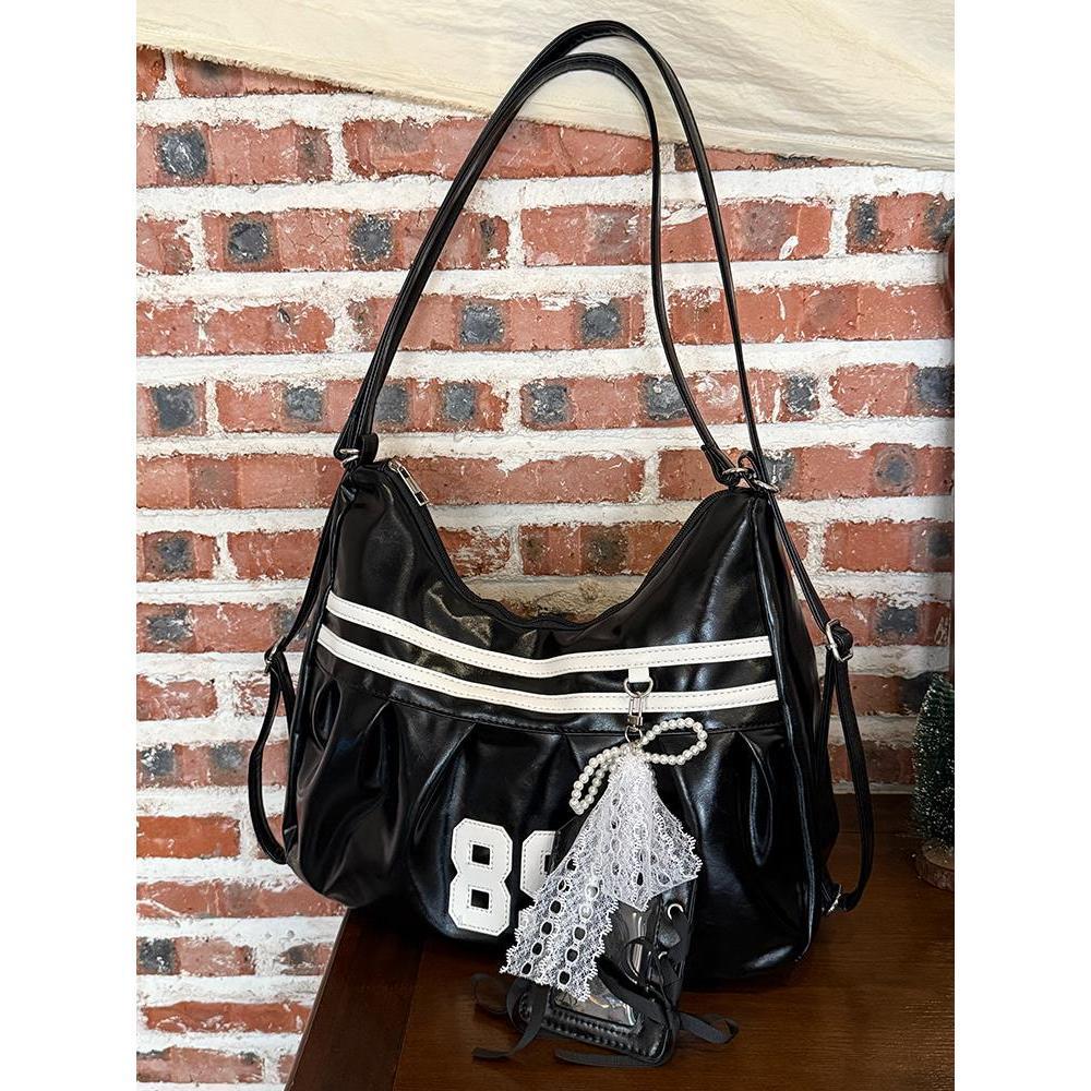 

Нишевая сумка в стиле миллениалов женская 2025 новая трендовая высококлассный рюкзак студентка колледжа на занятия на плечо сумка-тоут