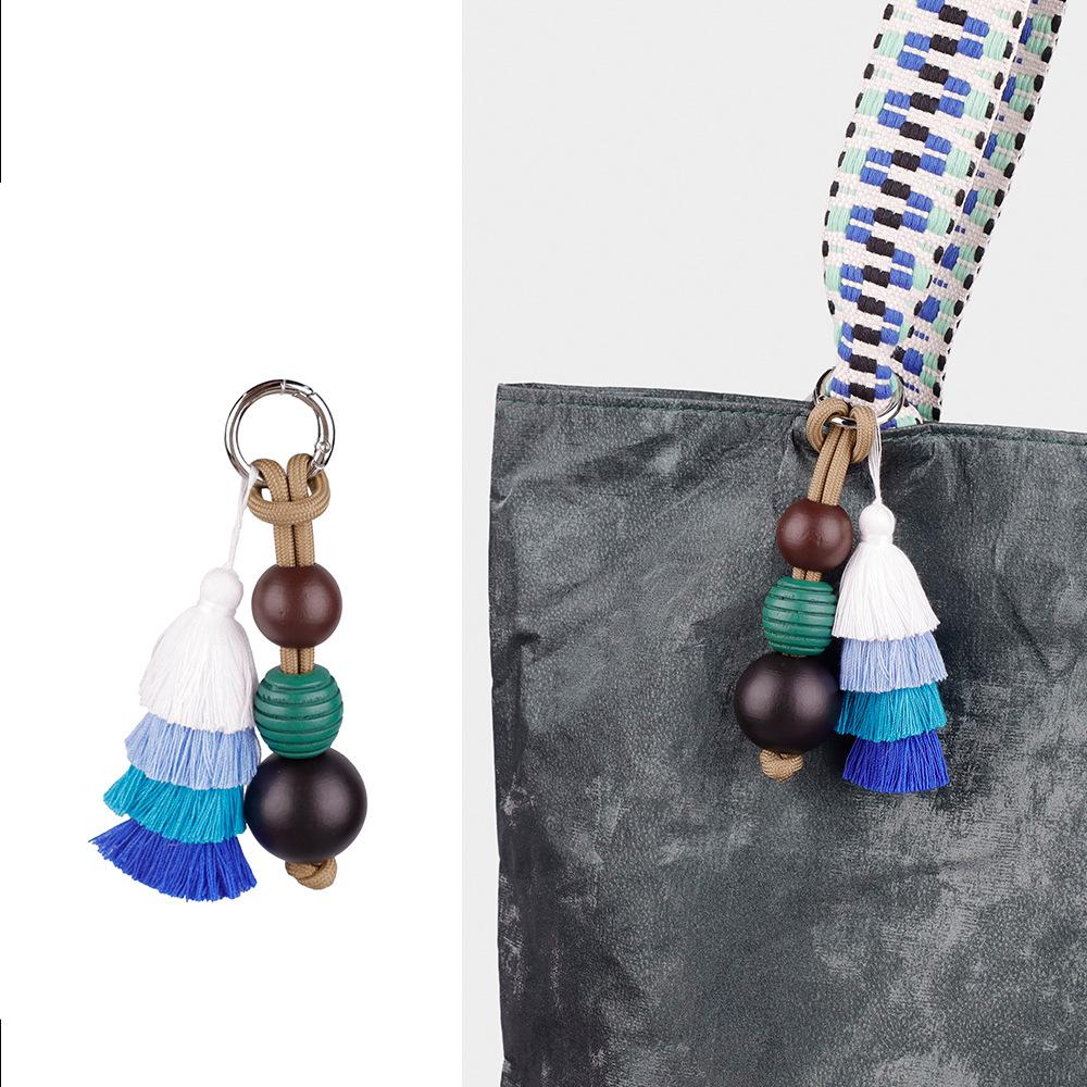 Hochwertiger Taschenanhänger mit niedlichem Ball und Dopamin-Quaste, fester Schlüsselanhänger-Zubehör, vielseitige kreative Mode-Serie