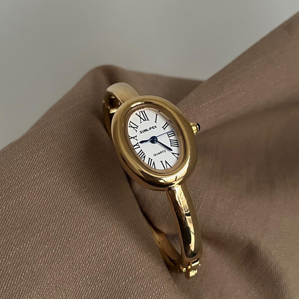 Dámské křemenné hodinky Luxusní římské číslice Reloj Minimalistické Jednoduché Oválné hodiny Dámské Nerezová ocel Orologio Zlaté pouzdro Náramkové hodinky