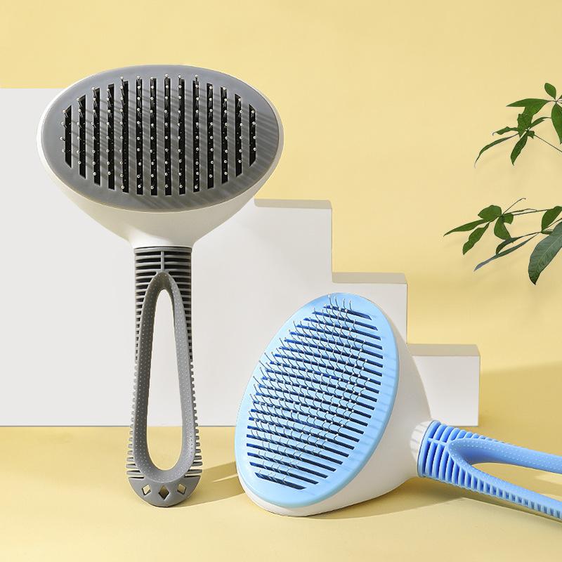 Pet hair removal comb modeling hair removal open knot cat comb automatic fading beauty dog comb hair brush pet supplies