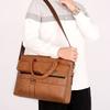 The neutral color men's handbag is suitable for business trips and can also be carried  e shoulder.It is made of PU material
