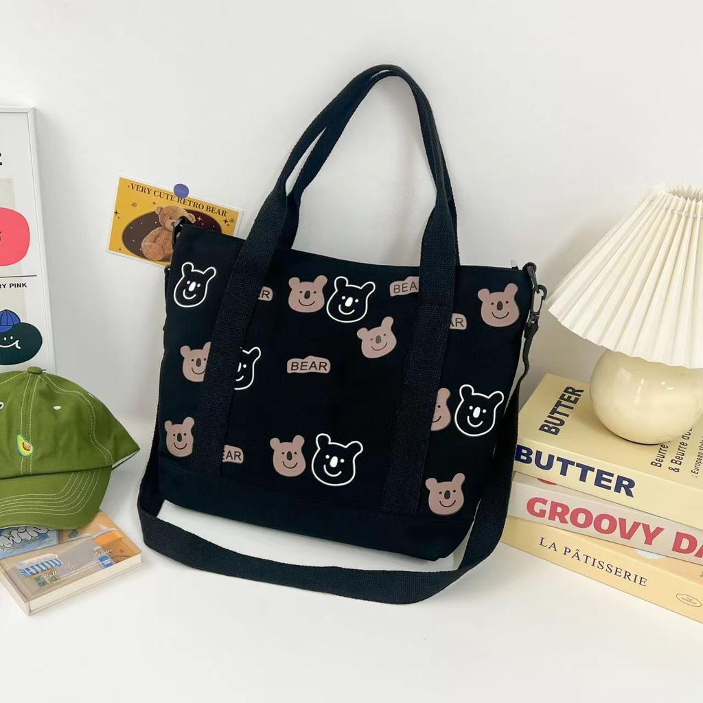 Large capacity versatile canvas shoulder bag bag female student make-up bag portable shopping bag cute AB bear bag