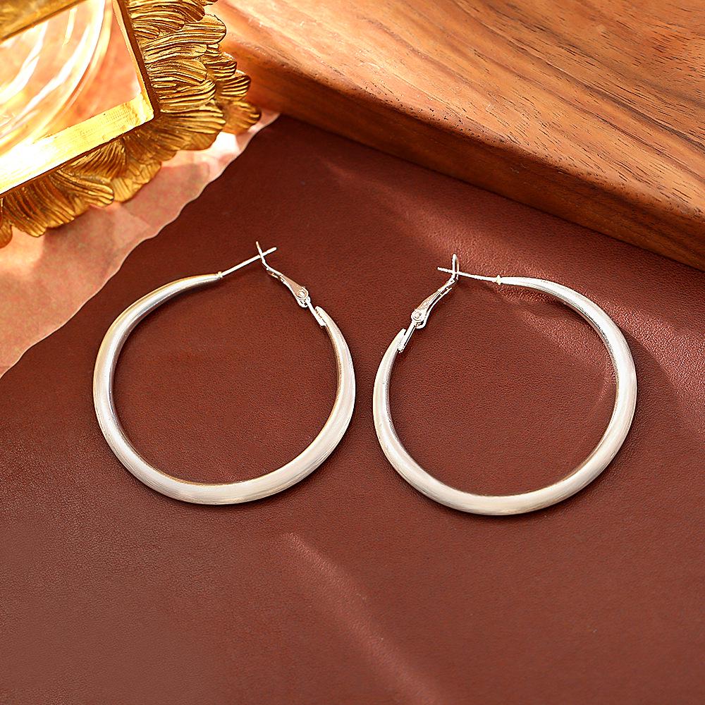 Trendy European & American Matte Gold Earrings: Sleek, Fashionable, High-End Style with a Modern Edge