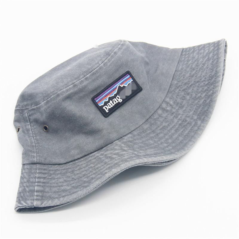 Bavlněný klobouk typu bucket hat s vyšívanými písmeny pro ochranu před sluncem a pro volný čas