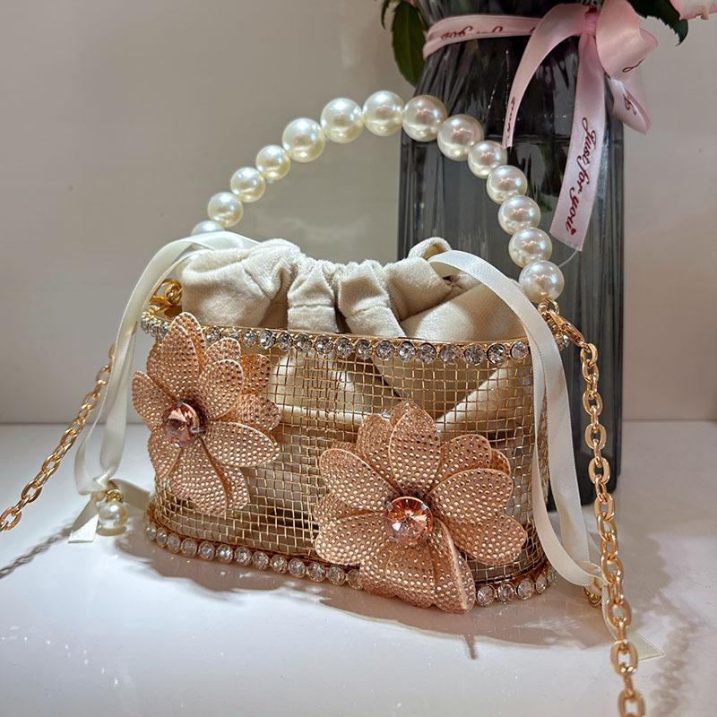 

Diamond-encrusted rhinestone flower metal bucket bag, Xiaoxiangfeng hollow high-end handbag