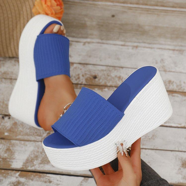 2025 summer new large size solid color wedge heel one-word slippers women wear thick-soled knitted mesh wedge heel cool slippers