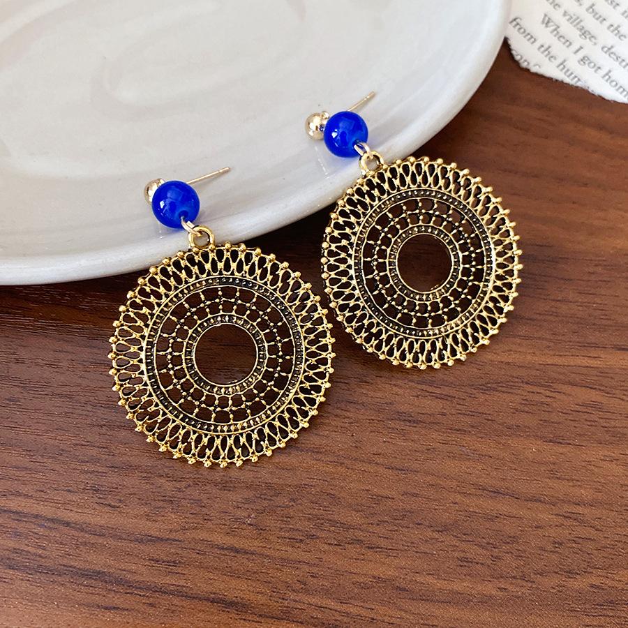 Silver needle new Chinese round hollow pendant earrings ethnic style retro earrings women s fashion earrings design sense niche