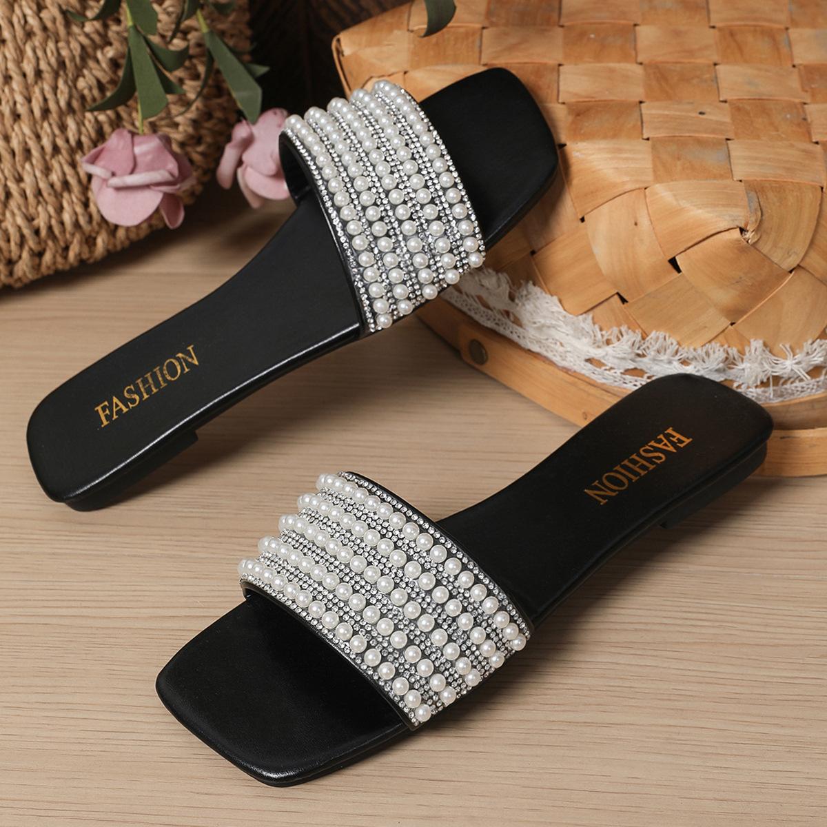 

Модные однотонные женские тапочки со стразами и жемчугом на плоской подошве 2025 года, летние новые однопедальные тапочки с одним словом, верхняя одежда 43 чёрный