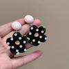 Retro Hong Kong style simple black and white polka dot flower earrings geometric oval temperament earrings fashionable personalized versatile earrings