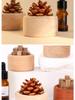 Creative Pine Cone Portable Aroma Diffuser: Wooden Essential Oil Air Freshener Ornament for Home and Car.