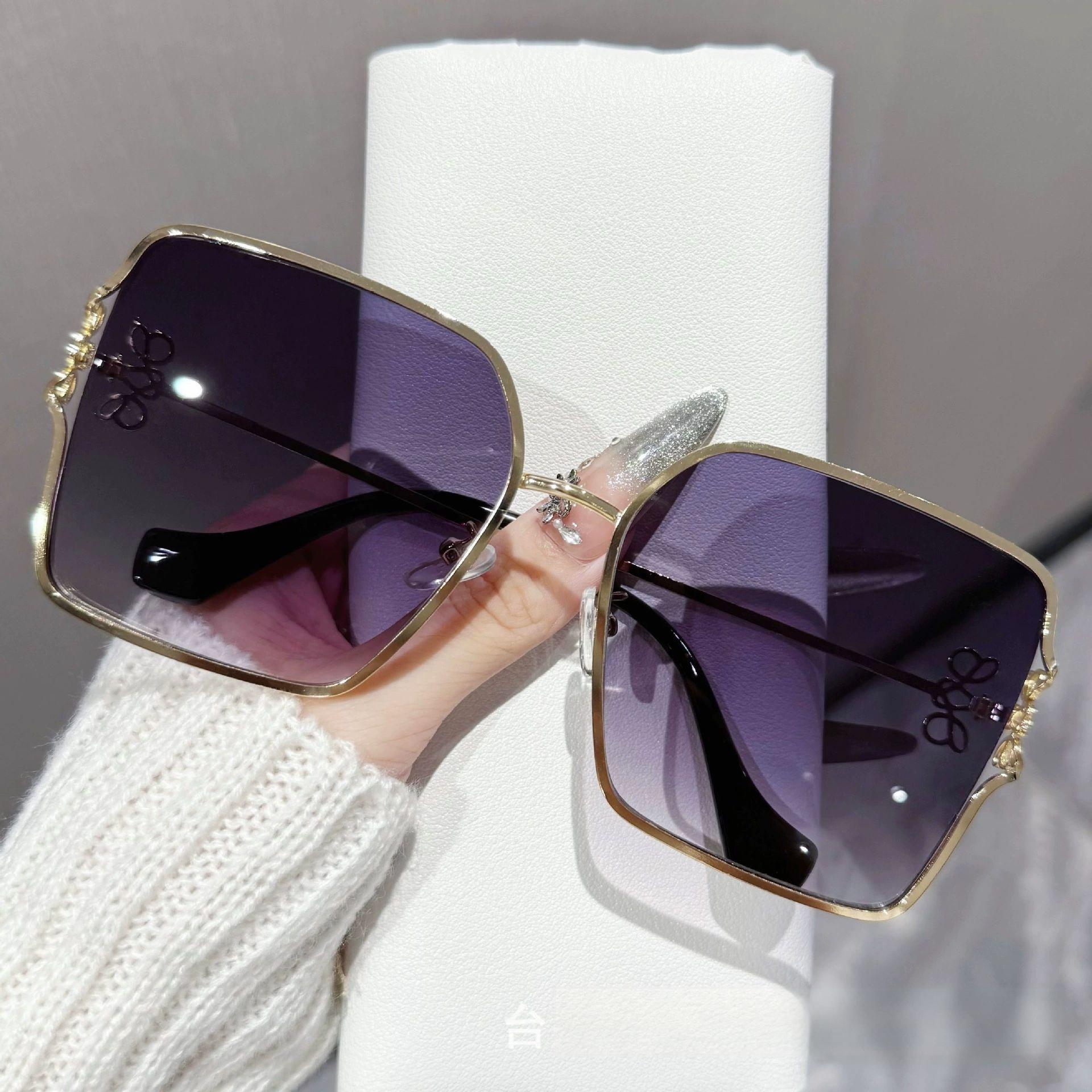 New style light luxury logo fashion metal sunglasses for women DS-25016