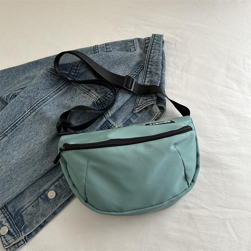 New casual messenger bag men and women versatile commuting class large capacity student mailman couple outdoor sports bag