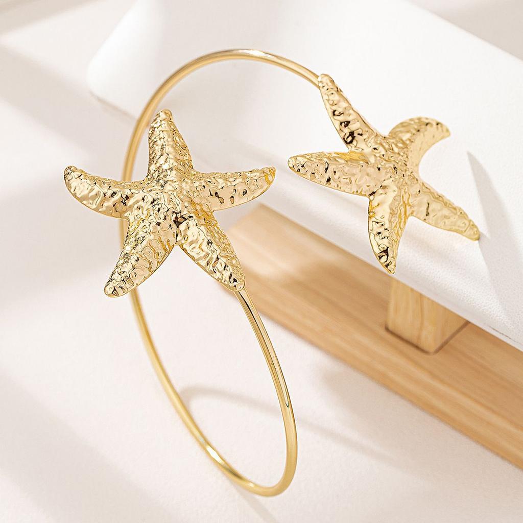 Fashion ocean wind three-dimensional starfish metal rotating open arm ring women multi-occasion vacation wind seaside wear