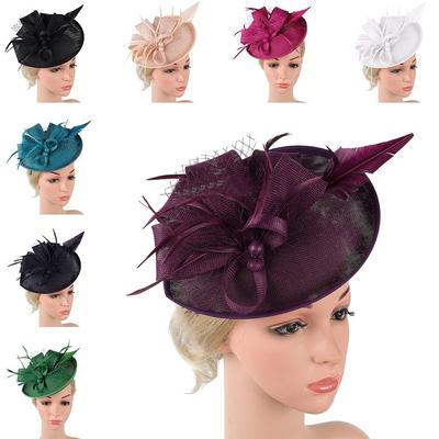 Nuevo tocado de malla con plumas para fiestas de té y bodas.