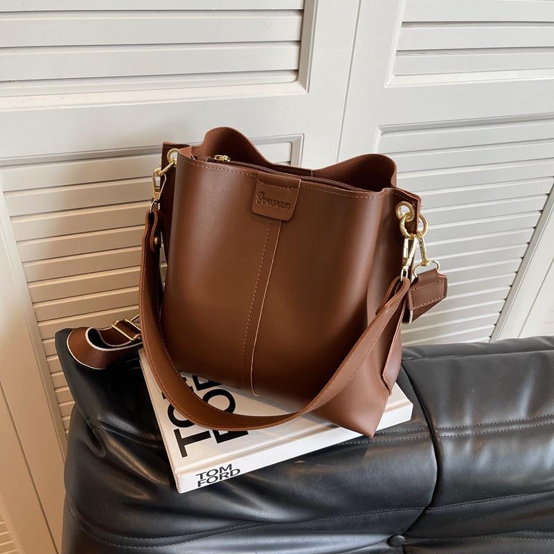 Women's Two-Tone Bucket Bag Stylish Faux Leather Crossbody Bag with Adjustable Strap Fashion Contrast-Trim Shoulder Bag