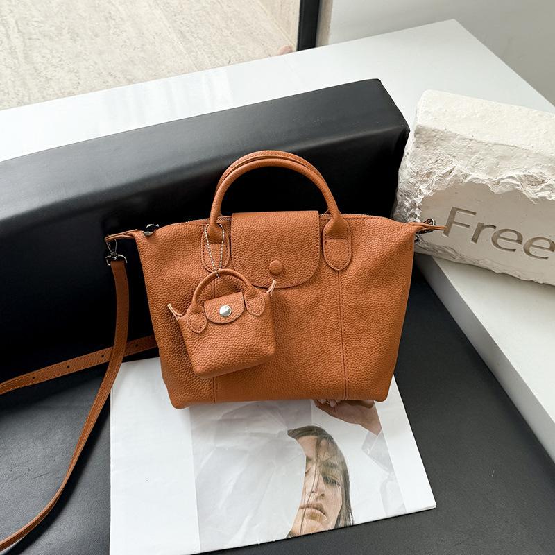 

Вместительная женская сумка-пельмень из натуральной кожи, сумка через плечо на одном плече