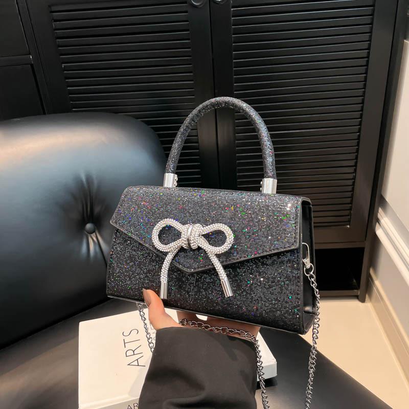 Fashion and simple temperament bow handbag 2025 summer new foreign style shoulder crossbody small square bag