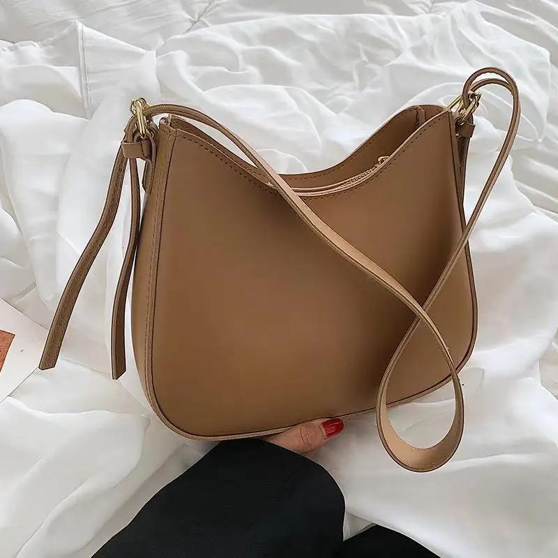 Retro einfarbige Damen-Reisetasche Messenger Bag Plutoniumleder Umhängetasche vielseitige Bucket Bag für Damen