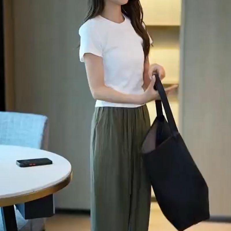 

Женский облегающий костюм-двойка в корейском стиле: Футболка с прямыми плечами и широкие брюки из ледяного шелка L (Recomm. 110-125 jin)